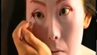 Japanese Maiko painting her face - 1999