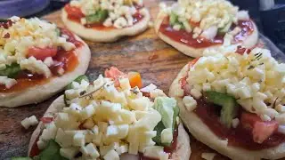 🧀🍕Mini pizza Bites|ಪಿಜ್ಜಾ ಬೈಟ್ಸ್ |kids special pizza recipe|pizza on tawa| no oven veg Mini pizza 🧀🍕