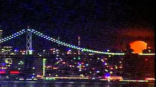 The moon setting over San Francisco