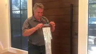Red Horse Pivot Door - performance video - air infiltration and tight close