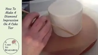 How to use an impression mat on buttercream, imprinted diamond pattern cake decorating tutorial