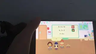 Playing Petite Professor/ My School! On my phone.