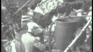 Men Inspect Illegal Alcohol Still during Prohibition