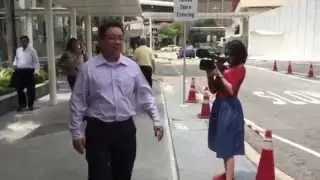 Amos Yee's father arriving at State Courts