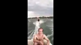 Water skiing on vintage Chuck Stearns Trixter skis