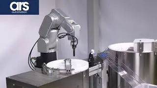 A new flexible feeder for automatic parts feeding to an assembly workstation