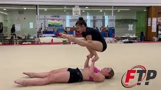 Partner Floor Press with Straddle L-Sit Hold position