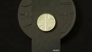 Монеты Великобритании 5 пенсов 2003 года и 5 пенсов 2014 года. 