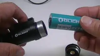 Olight Odin. 2000 Lumens. Tactical USB rechargeable flashlight w/remote pressure switch.