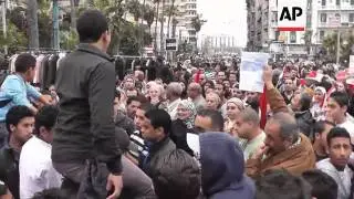Clashes between pro- and anti-Morsi protesters, rallies against referendum