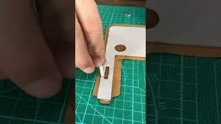 installing invisible magnetic snaps for flap closure on this leather case!