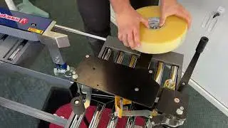 Carton Sealer - How to load machine Tape onto a Taping Head.