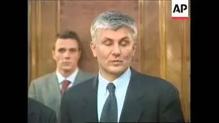 More pictures, Milosevic handed over to war crimes tribunal