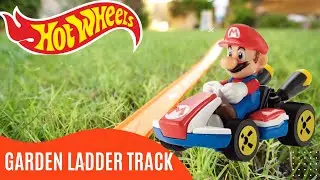 Hot wheels Mariokart Garden Slide - Slow Motion Excitement! #mrsuperwheels #hotwheelsstunts