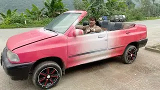 The beautiful girl repaired and perfected her favorite car.