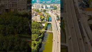 Vertical video. Ghent, Belgium. Keizerpark - City park. Esco (Scheldt) river embankment. Panorama...