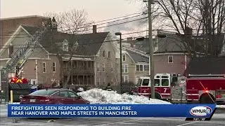 Firefighters respond to building fire in Manchester