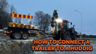 How to connect a trailer to a HUDDIG backhoe loader