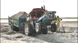 Heavy loaded trolley stuck with Ford tractor 3610