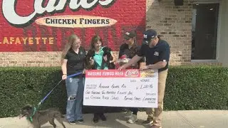 Acadiana Animal Aid receives donation from Raising Cane's on National Adopt a Shelter Pet Day