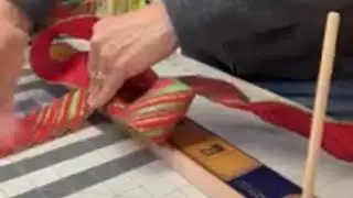 Making a bow with an E-Z bowmaker .