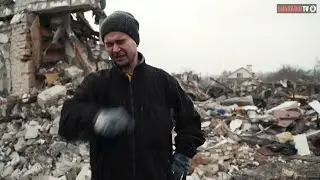 Ukrainian father weeps for wife killed in Russian attack on their home