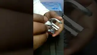 hanayama puzzle solving/ joint ring puzzle
