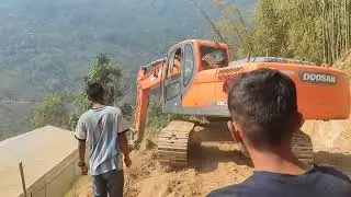 JCB Excavator: Tackling Slippery Hills, Crafting Roads for Hilly Village Communities!