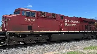 BNSF 8454 with CP & KCS Power Leads the E-SPTNAM0-37D