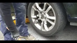 Removing the most stuck wheel bolt on planet Earth!! (Cutting alloy off)