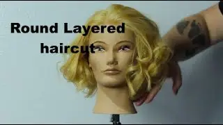 Short bob haircut with round layers.