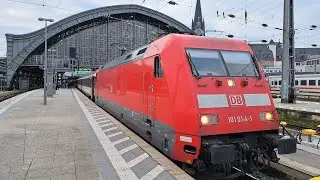 Germany: At Koln Hbf, a DB Class 101 electric loco departs on train EC7 0421 Hamburg Altona - Basel