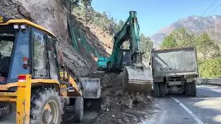 Sliding portion !! Pocklain machine loading stone and soil in dumpers