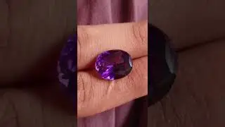 Oval-shaped amethyst with deep purple sparkle and elegant curves. 💜#Amethyst #OvalAmethyst