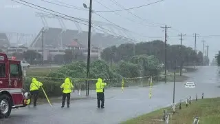 Driver stuck in flooded Key road