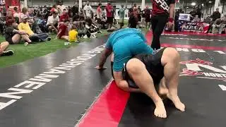 NAGA 250+ weight class. Submission from mounted smother.