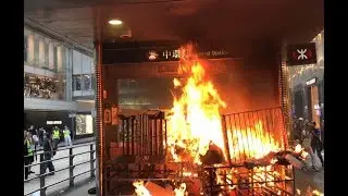 Thugs set fires on roads, MTR exit in central Hong Kong