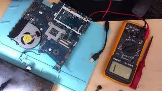 Steps to diagnose the Lenovo ideapad 300-15isk not turning on due to a short on the board