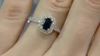 Emerald cut Sapphire and Diamond Halo Engagement Ring