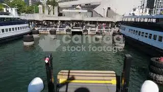 Passenger view ferry arriving at Jack Layton terminal stock video. Toronto, Canada. 4K stock video.