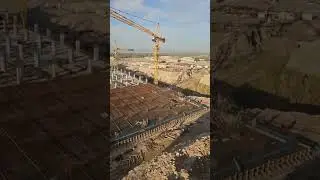 كراج متعدد الطوابق / تطوير ما حول العتبة العلوية المقدسة