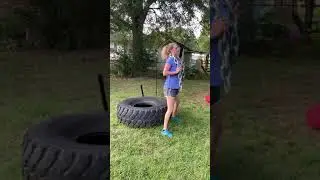 General Population Strength and Conditioning: Chain Loaded Tire Squat With Notes