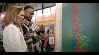 Annabel Croft teaches Johannes Radebe about the Caravan and Motorhome Club