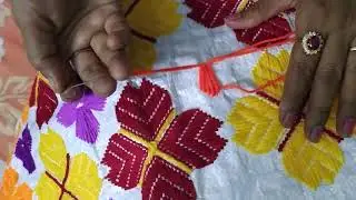 Hand embroidery on plastic sack stitch. Plastic sack stitch table met or door met.