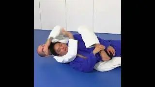 Rear Naked Choke: Lifting The Head Exposing The Neck When Opponent Falls To Overhook Side by Marcel