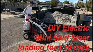Electric Mini Skid Steer at work, loading rocks!