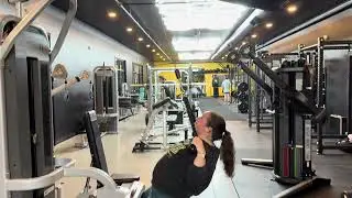 Rear delt: seated at lat pull down machine face pull with ropes ￼