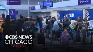 Snow, wind descend on Chicago as travelers take to airports