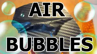 How to remove air bubble from vinyl film. How to wrap laptop in carbon fiber vinyl? faq tutorial