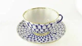Porcelain cup with saucer - 